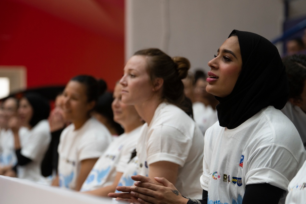 U.S. Airmen, Soldiers, and Kuwait volleyball teams compete in exhibition games for International Day of Peace