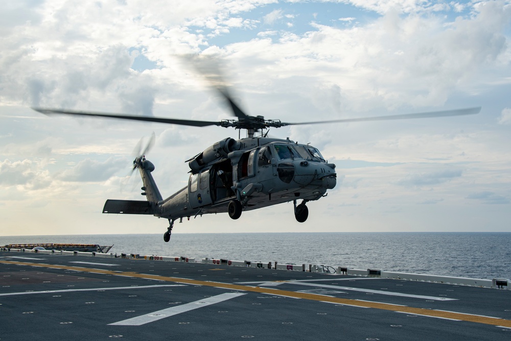 USS America (LHA 6) Conducts Flight Operations with Helicopter Sea Combat (HSC) Squadron 25