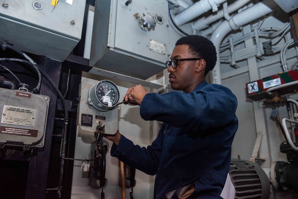 USS Ronald Reagan (CVN 76) Sailors reinstall gauges on AFFF station 6