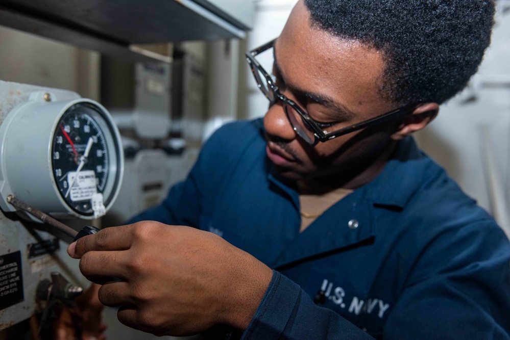 USS Ronald Reagan (CVN 76) Sailors reinstall gauges on AFFF station 6