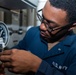 USS Ronald Reagan (CVN 76) Sailors reinstall gauges on AFFF station 6