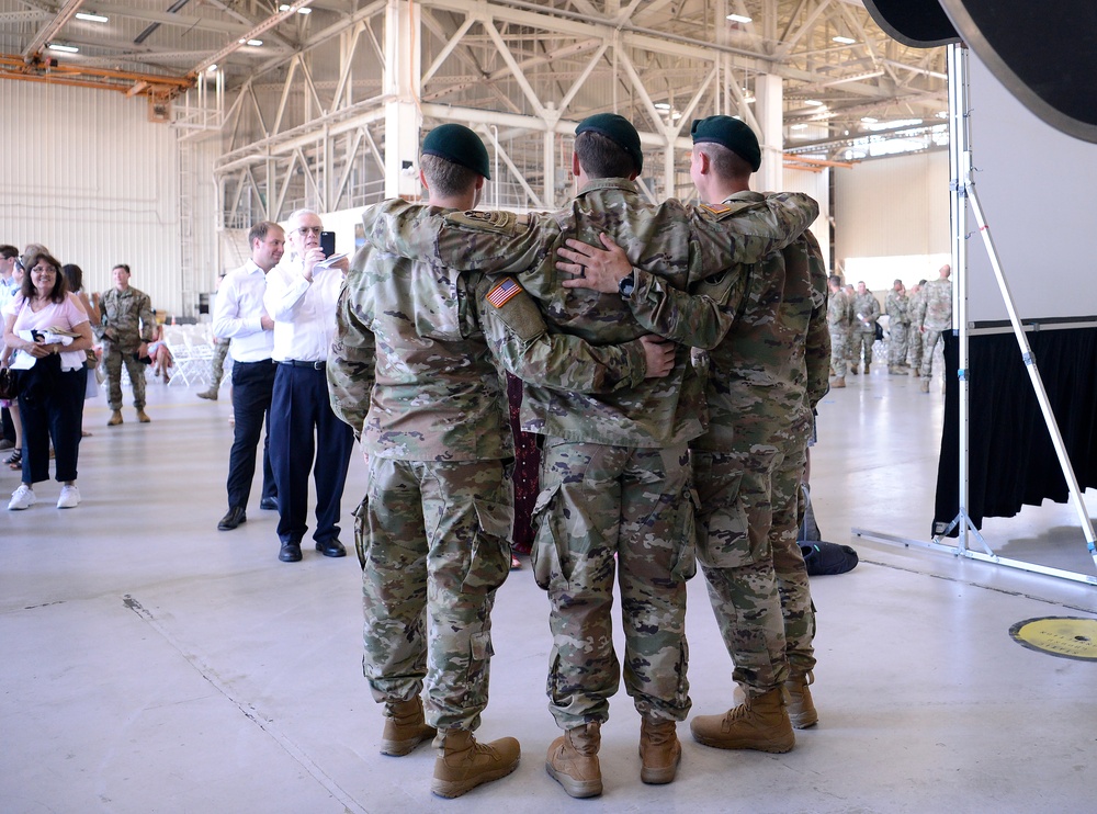 Soldiers Don Green Beret at Ceremony