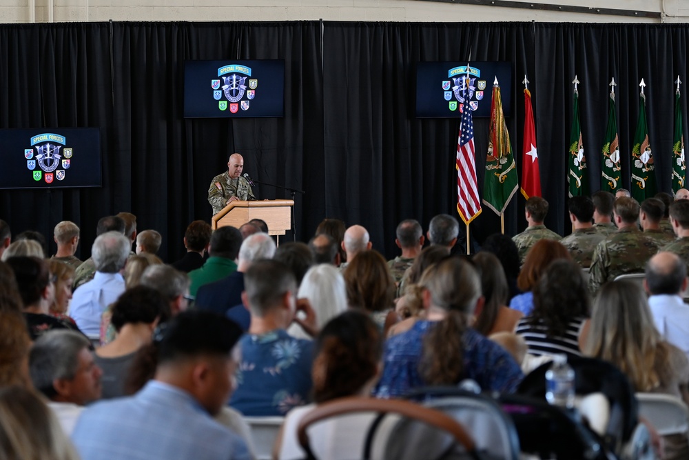 Soldiers Don Green Beret at Ceremony