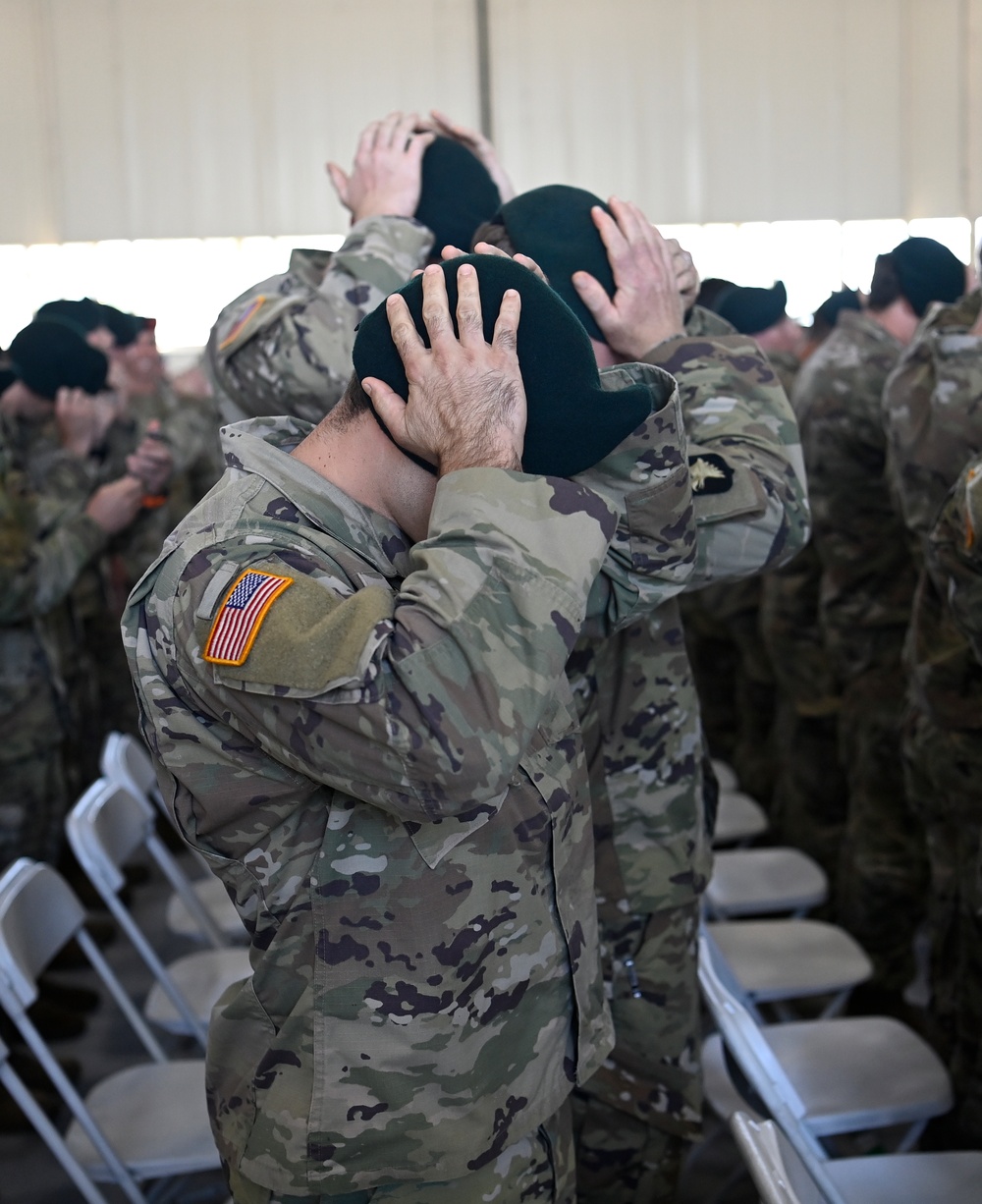 Soldiers Don Green Beret at Ceremony