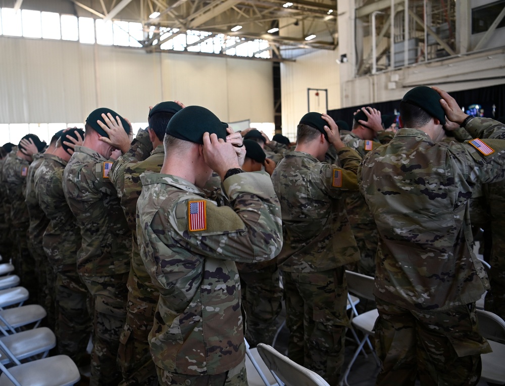 Soldiers Don Green Beret at Ceremony