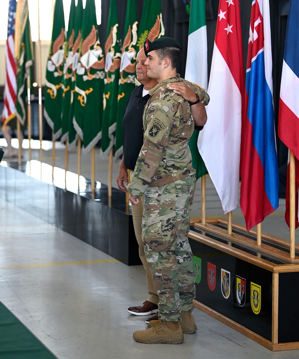 Soldiers Don Green Beret at Ceremony