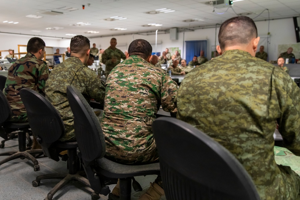 Task Force Nighthawk and coalition force leaders meet in preparation for exercise start