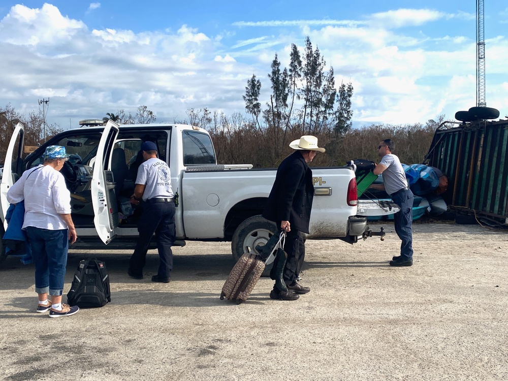 Firefighters Help Hurricane Ian Survivors