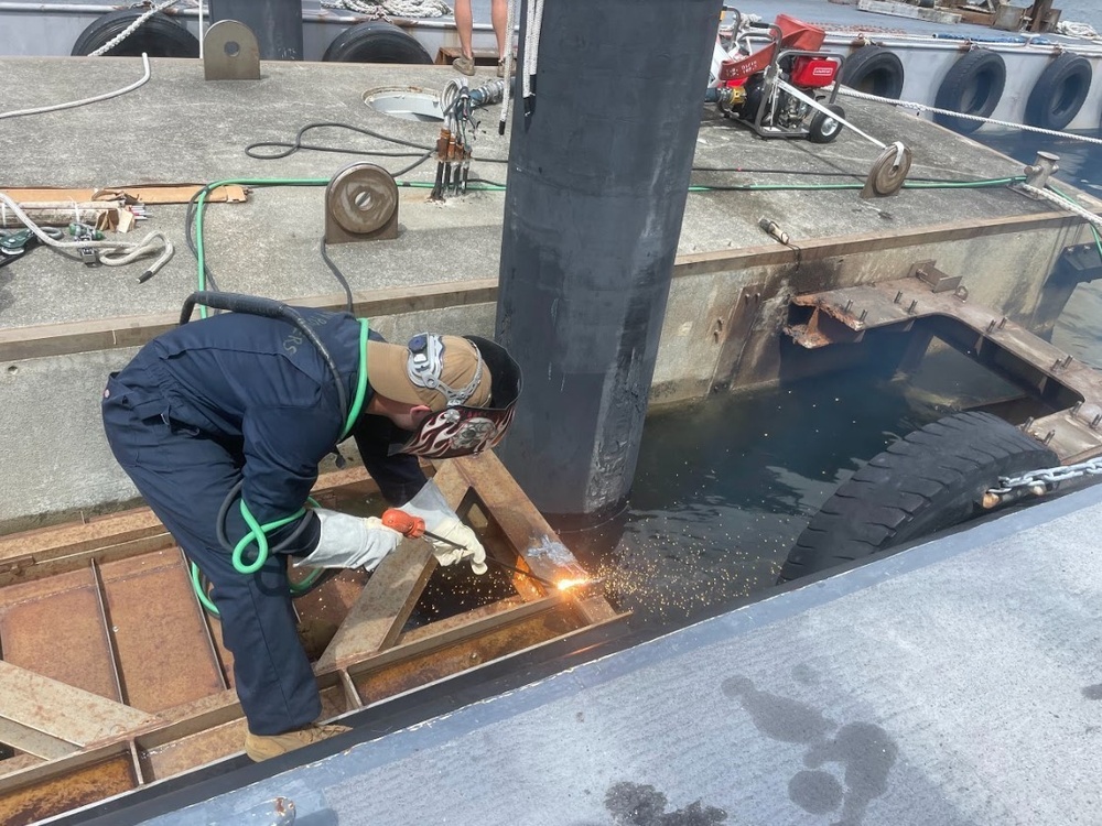 UCT 2 Repairs at Akasaki Wharf U.S. Navy Fuel Station Akasaki in Sasebo, Japan