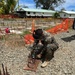 Lance Cpl. Armando Gorosavevacio with 7th Engineering Support Battalion, repurpose steel plating for base pedestals of new living units at Camp Katuu.