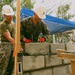 Marine's with 7th Engineer Support Battalion laying Concrete Masonry Units block courses for the Phước Hòa primary school in Vietnam.