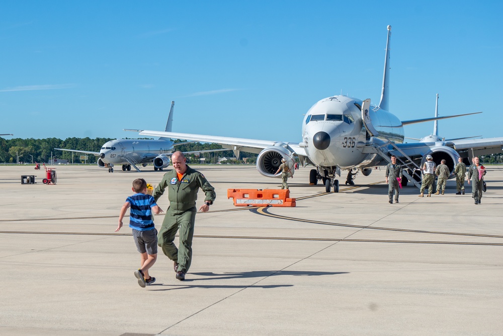 Lt. Cmdr. Chappell Reunites with Son Following P-8A Deployment