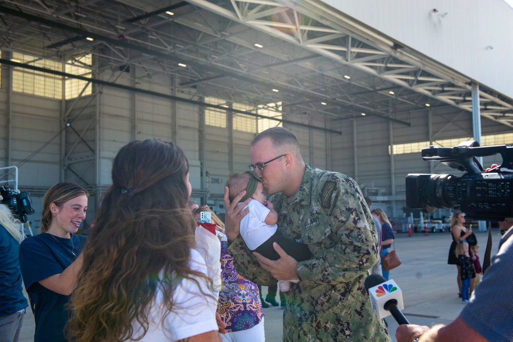 AE3 Wolfe Reunites with Family Following Deployment