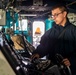 U.S. Navy Sailor Mans The Helm