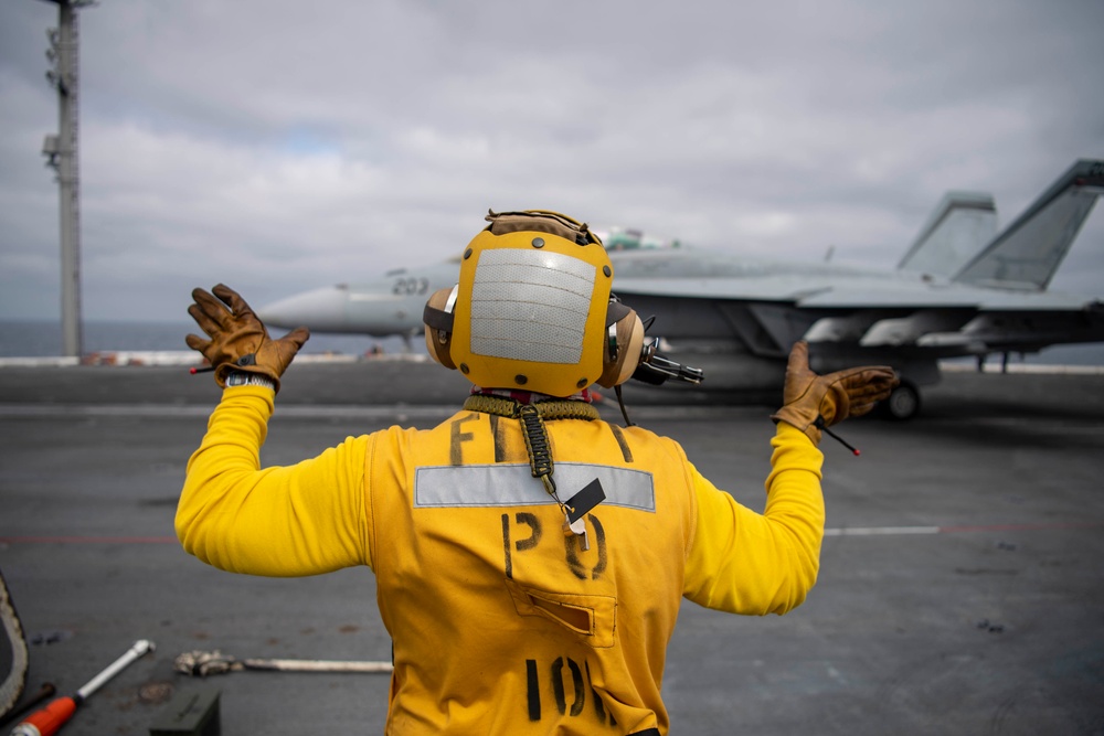 Sailor Directs An F/A-18E