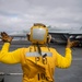 Sailor Directs An F/A-18E