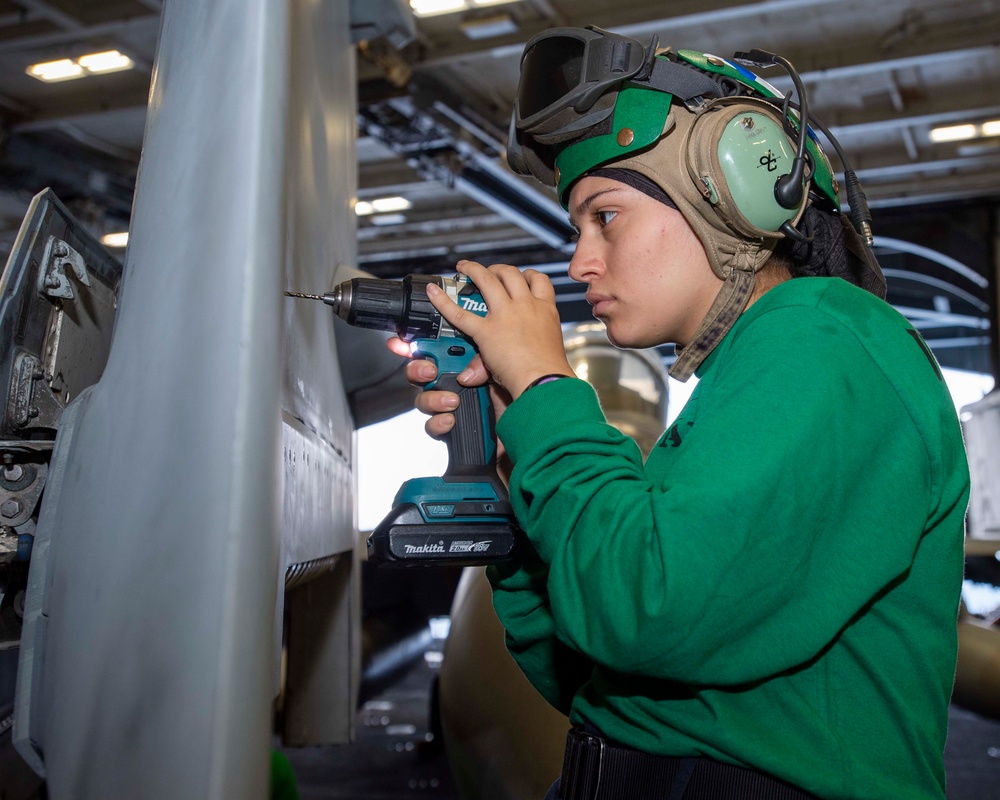 Sailor Removes Fasteners