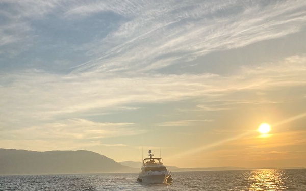 Coast Guard, other agencies rescue 3 people, dog from sinking vessel