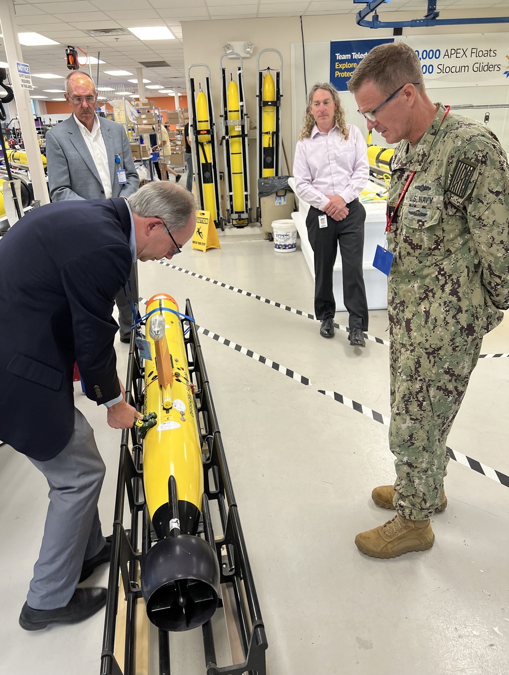 Admiral Piret Visits and Tours Teledyne