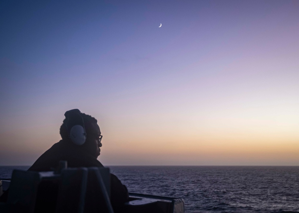 U.S. Sailor Stands A Lookout Watch