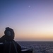 U.S. Sailor Stands A Lookout Watch