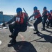 U.S. Sailors Heave The Line During An Underway Replenishment