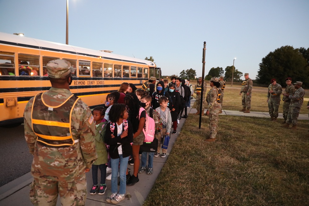 Soldiers Walk Students for the National Walk to School Day at Freedom Park School