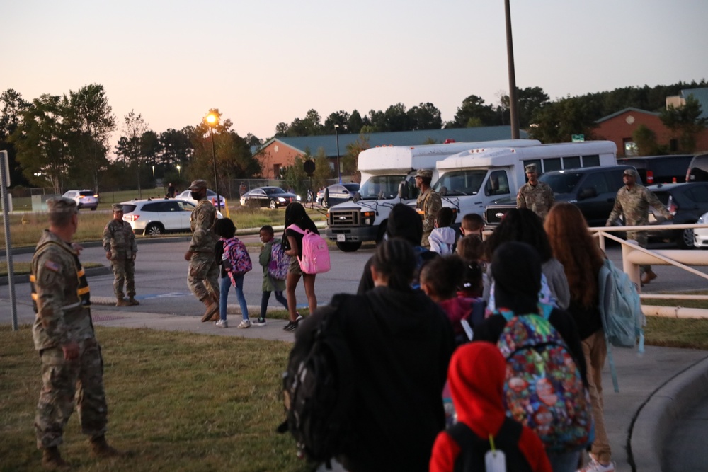 Soldiers Walk Students for the National Walk to School Day at Freedom Park School