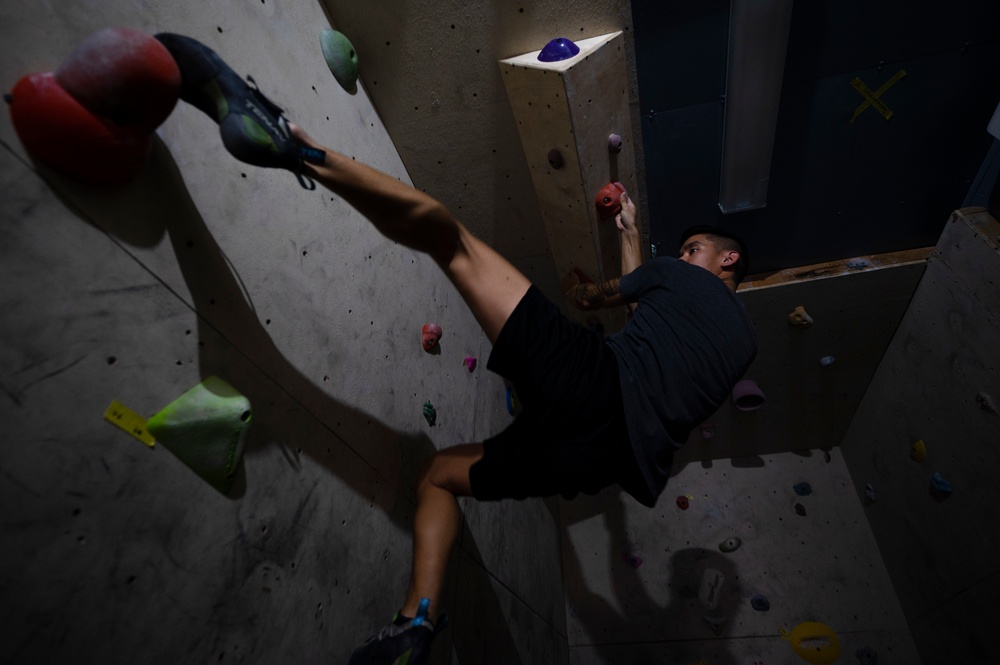 386th AEW Airmen create rock climbing community