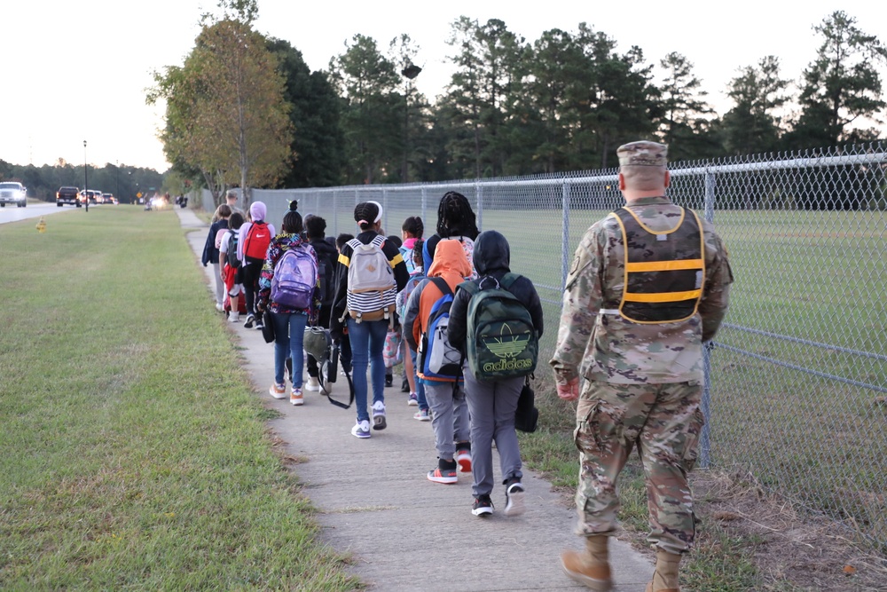 Soldiers Walk Students for the National Walk to School Day at Freedom Park School