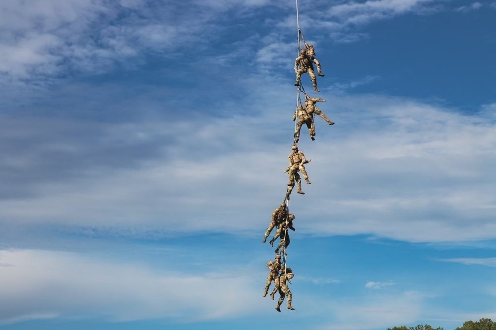 Dragon Masters take flight during Special Patrol Insertion Extraction System training