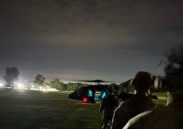 Dragon Masters take flight during Special Patrol Insertion Extraction System training