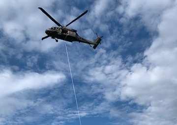 Dragon Masters take flight during Special Patrol Insertion Extraction System training