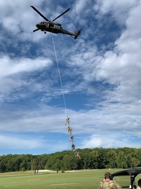 Dragon Masters take flight during Special Patrol Insertion Extraction System training