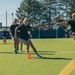 Boston Marines host Harvard field hockey team building