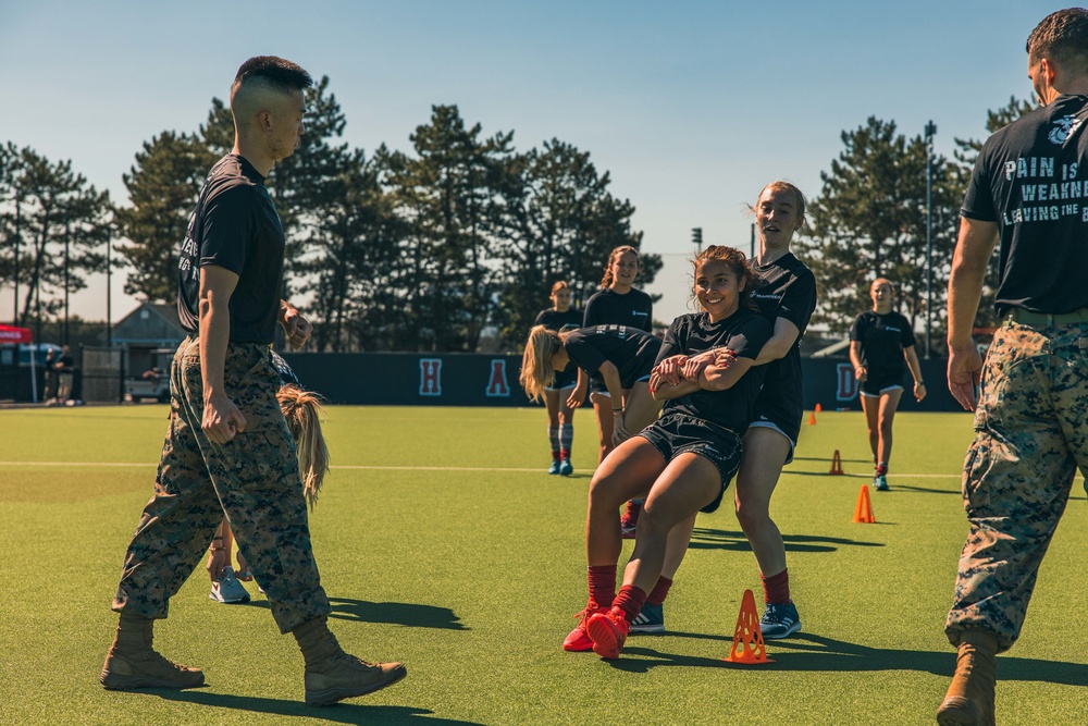 Boston Marines host Harvard field hockey team building