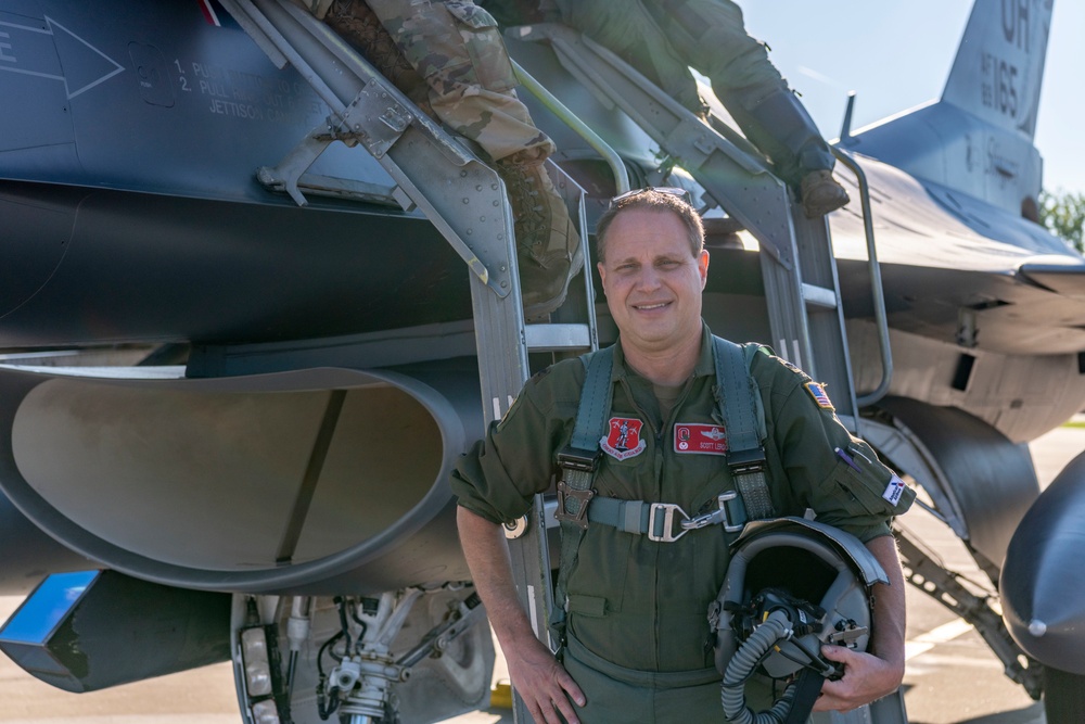 121st Commander Flies with the 180th