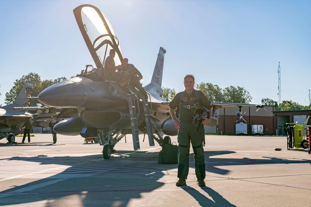 121st Commander Flies with the 180th