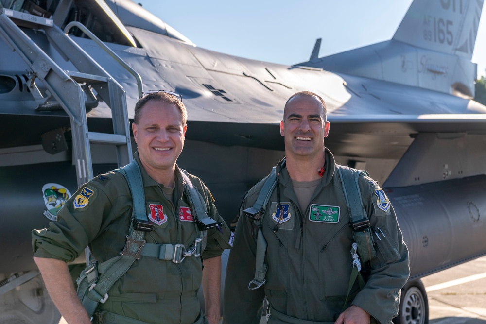 121st Commander Flies with the 180th