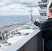 USS Ronald Reagan (CVN 76) Sailors observe weather conditions