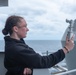 USS Ronald Reagan (CVN 76) Sailors observe weather conditions