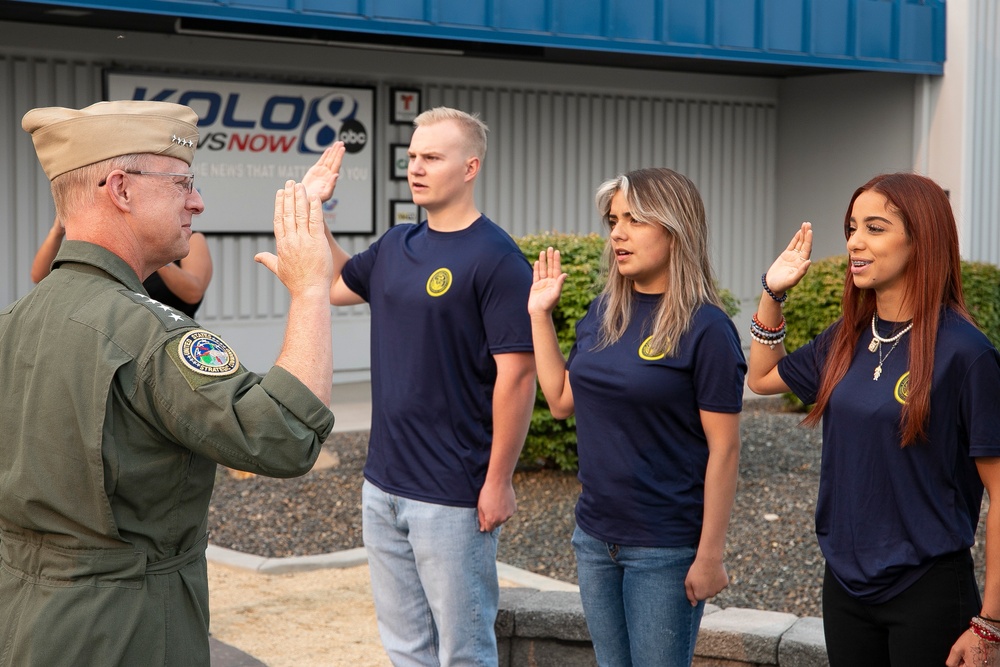 Admiral Caudle conducts oath of enlistment during stop in Reno, Nevada