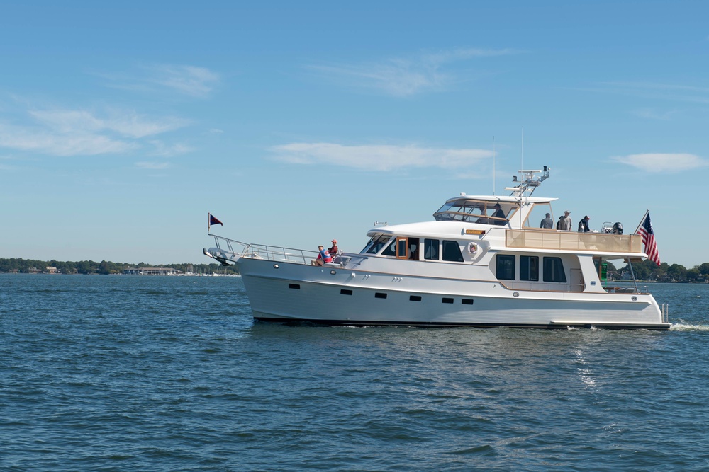 Sailors alongside the New Yorck Yacht Club celebrate the Navy’s 247th birthday.