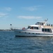 Sailors alongside the New Yorck Yacht Club celebrate the Navy’s 247th birthday.