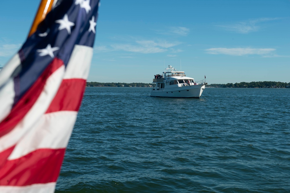 Sailors alongside the New Yorck Yacht Club celebrate the Navy’s 247th birthday.