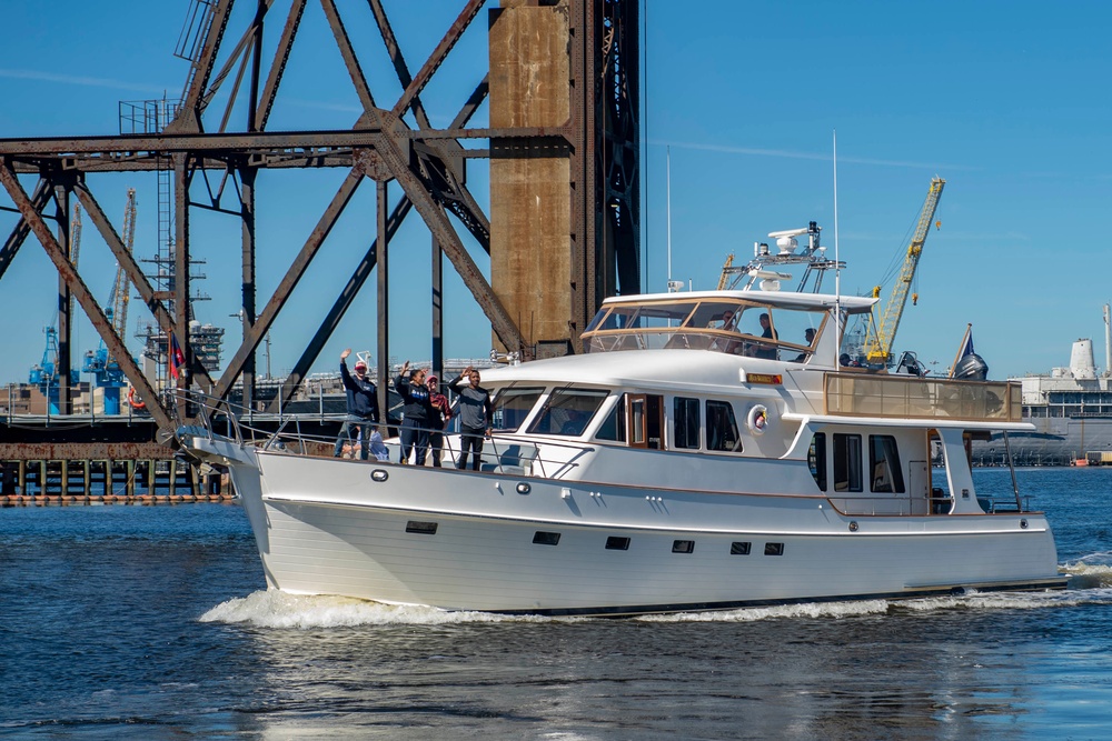 Sailors alongside the New Yorck Yacht Club celebrate the Navy’s 247th birthday.