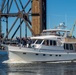 Sailors alongside the New Yorck Yacht Club celebrate the Navy’s 247th birthday.