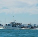 Sailors alongside the New Yorck Yacht Club celebrate the Navy’s 247th birthday.