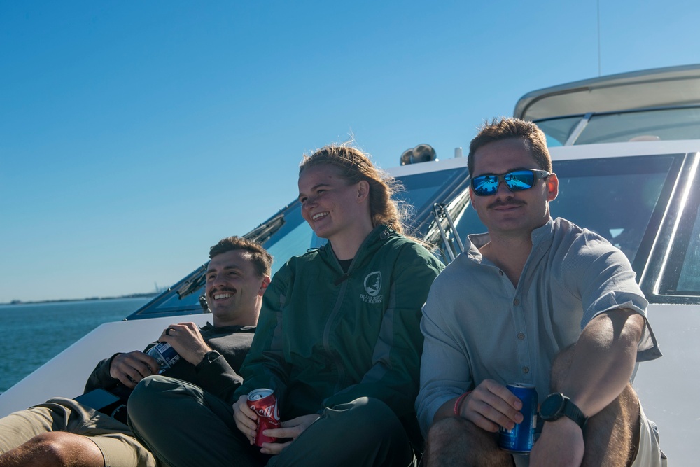 Sailors alongside the New York Yacht Club celebrate the Navy’s 247th birthday.