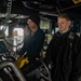 U.S. Sailors Stand A Helmsman Watch